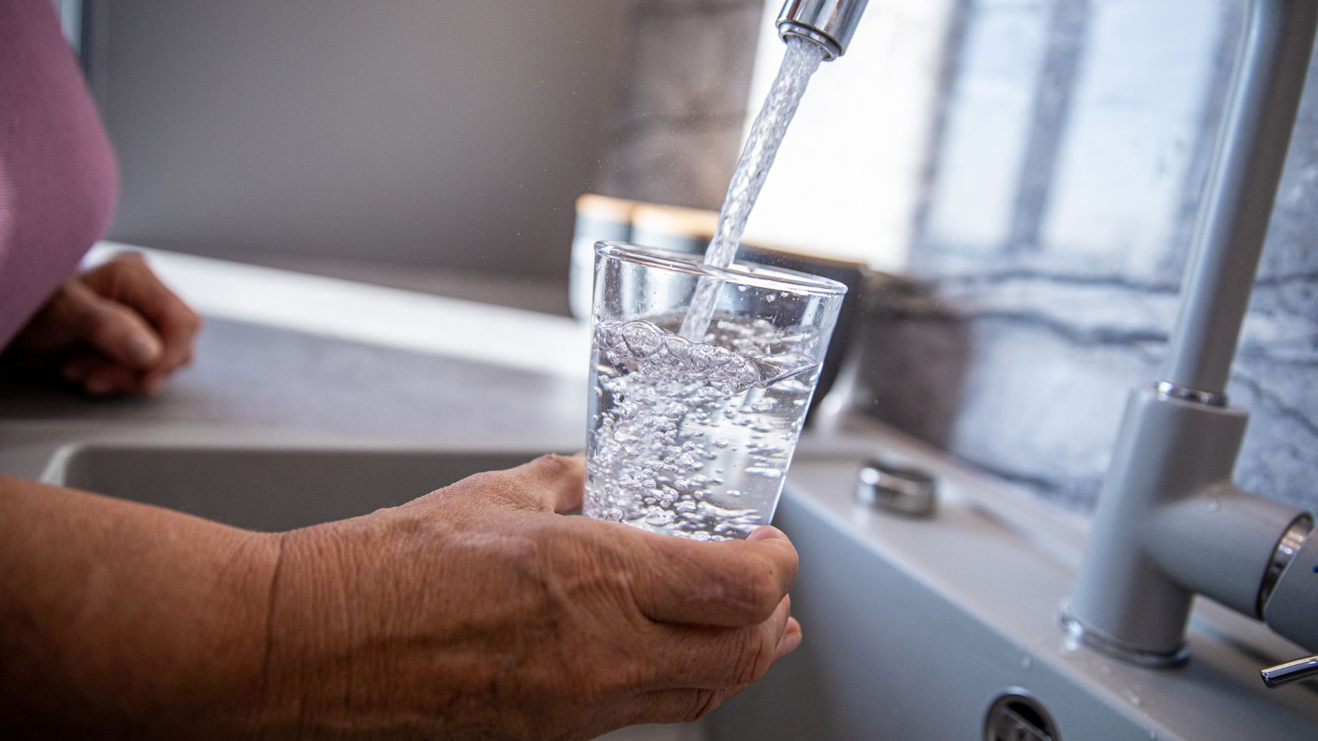Water Filtration System Installation cup of water